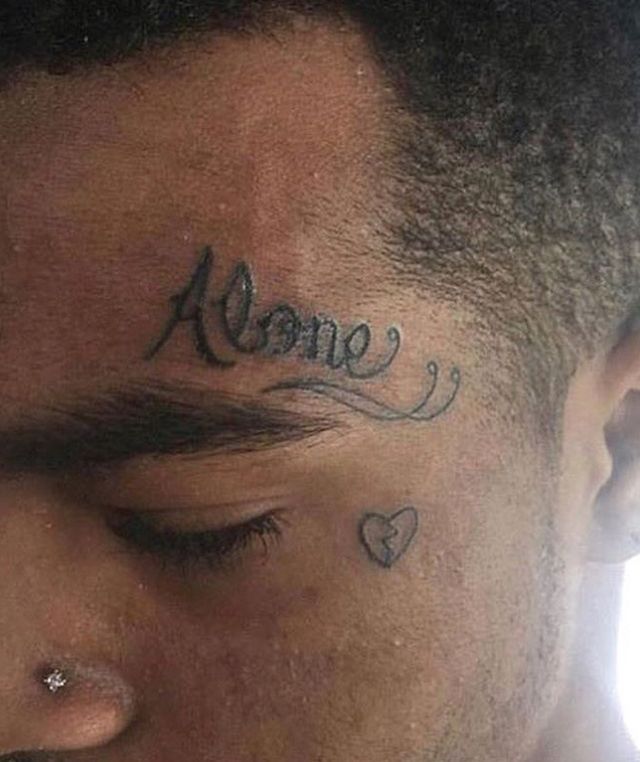 XXXTentacion Alone forehead tattoo