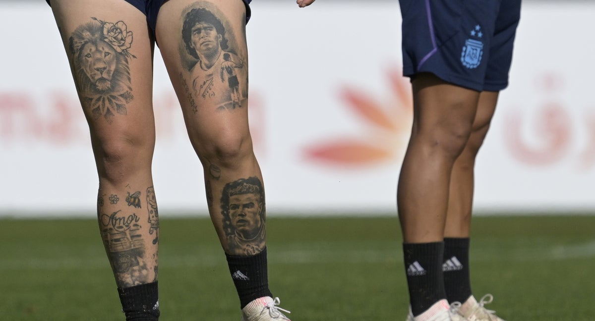 Yamila Rodriguez tattoos: Genuine single close-up of the lower legs, used for the Ronaldo portrait and lettering section.