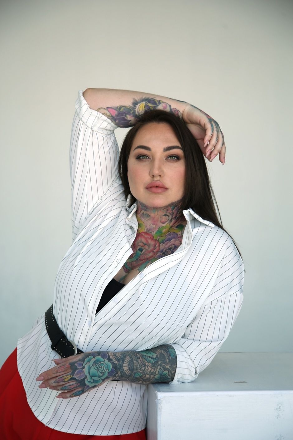 Yaroslava Naumenko tattoos: Documented body-wide tattoo collection including the continuing lower-body work