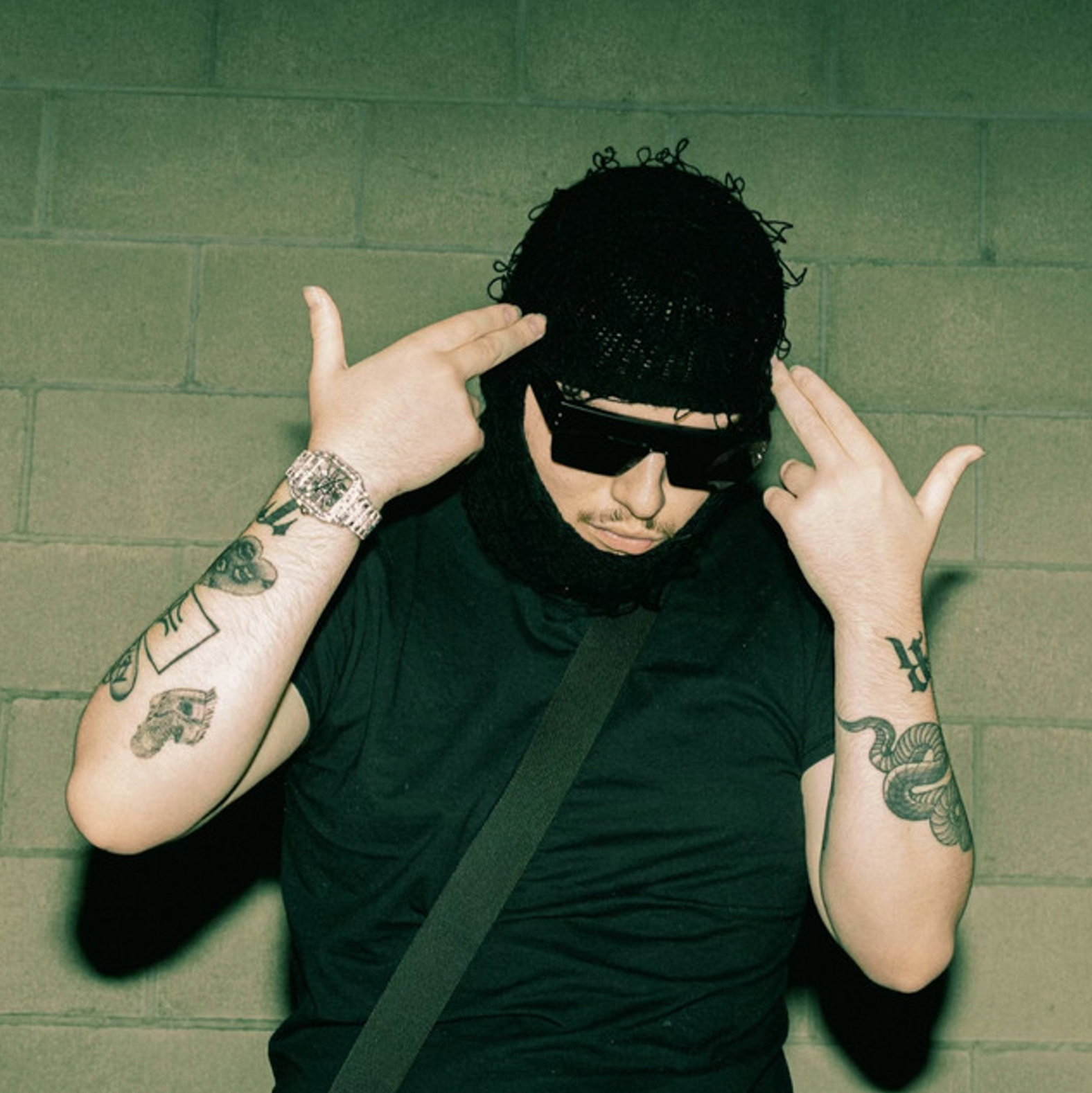 Yeat tattoos: forearm symbols and wrist ink