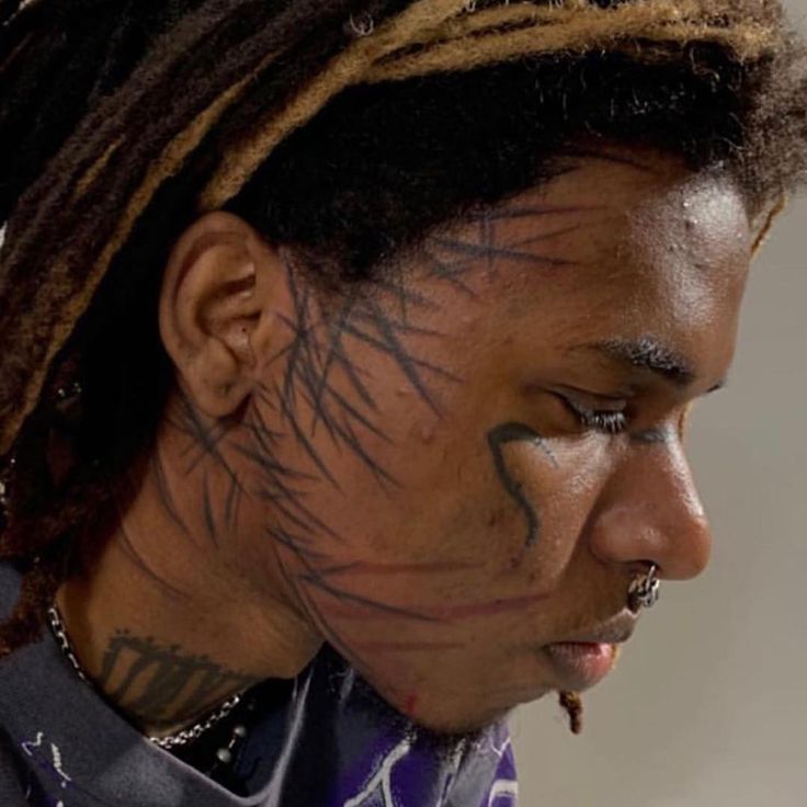 ZillaKami face profile tattoos
