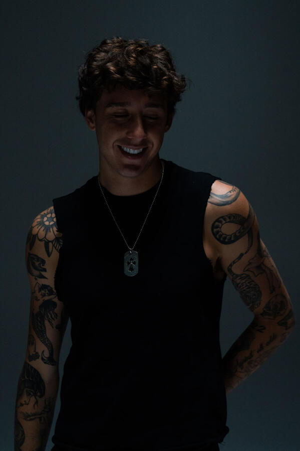 ZUEZEU tattoos: close forearm and hand tattoo evidence