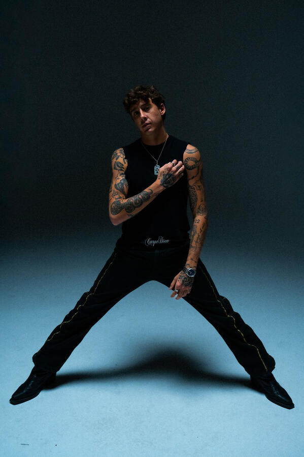 ZUEZEU tattoos: seated arm and hand tattoo evidence